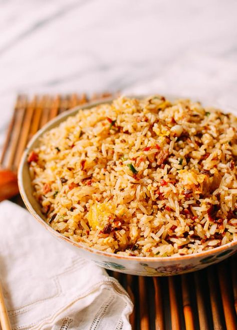 Chengdu-Style Sichuan Fried Rice is salty, toasted at the edges of every grain, and packed with salty, delicious bits of Jinhua ham, sui mi ya cai, and egg Rice Wok, Wok Of Life, Woks Of Life, The Woks Of Life, Cooking Jasmine Rice, Vegetable Fried Rice, Asian Grocery, Woks, Fried Vegetables