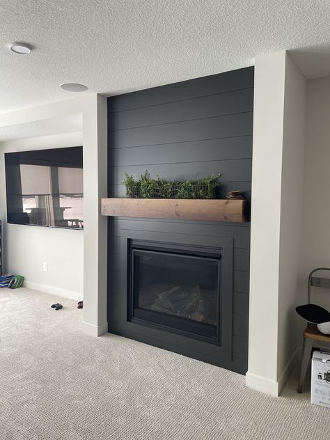 Grey Walls Black Fireplace, Cozy Basement Living Room Ideas, Chalet Basement, Tv Mantel Decorating Ideas, Dutton House, Mantle With Tv Decorating Ideas, Fireplace Decor With Tv, Black Shiplap Fireplace, Tv Mantel