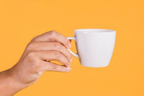 Behold, It Is Taken Off | HubPages Hand Holding Coffee Cup, Hand Holding Cup, Holding Coffee Cup, Pouring Coffee, Holding Coffee, Presence Of The Lord, Cup Art, Colored Background, Hand Holding