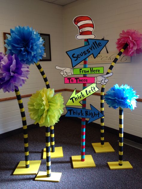 Dr. Seuss YW in Excellence truffula trees and direction sign Dr Seuss Truffula Trees, Seuss Decorations, Dr Seuss Decorations, O Grinch, Doctor Suess Birthday, Dr Seuss Party Ideas, Dr Seuss Classroom, Truffula Trees, Dr Seuss Activities