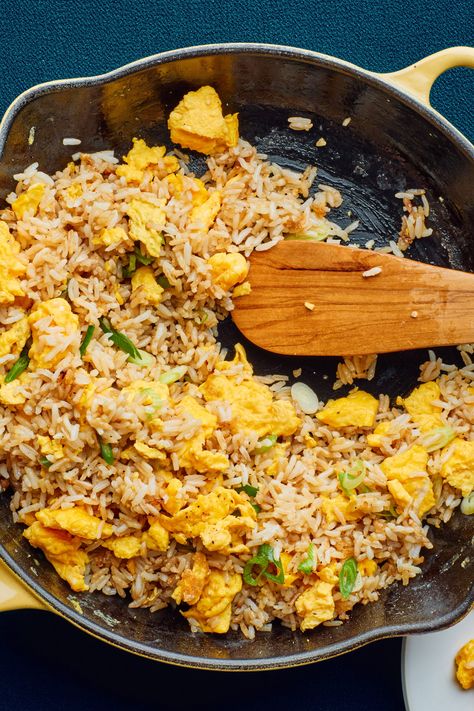 You don’t need a lot of ingredients—just a lot of ginger—for this quick comfort food. This easy fried rice is highly aromatic thanks to a heavy dose of fresh ginger. In traditional Chinese medicine, ginger is a key ingredient in postpartum care and is believed to help balance the body’s yin and yang, restoring the heat lost during childbirth. More widely, ginger is used to aid digestion and treat stomach upset and nausea, so consider this recipe as a pick-me-up when feeling poorly. Ginger Fried Rice Recipe, Vegetarian Mains, Foreign Food, Asian Kitchen, Ginger Recipes, Bon Appetite, Fried Rice Recipe, Most Popular Recipes, Vegan Meals