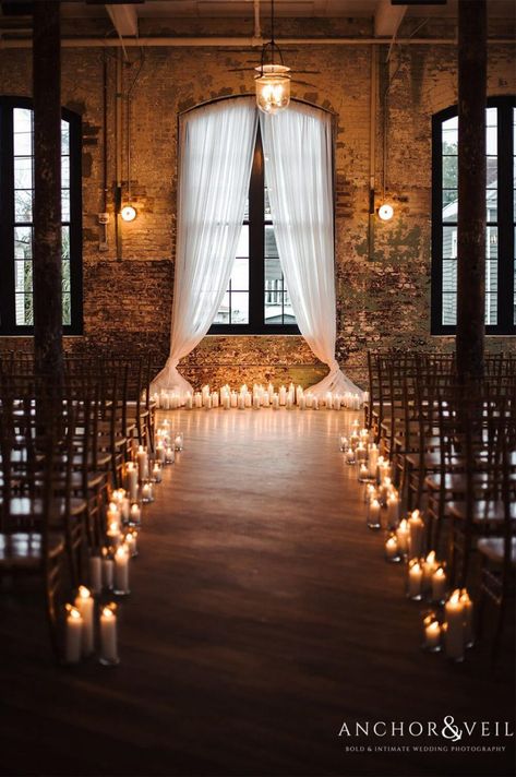 25 Eye-dropping Wedding Lighting to Make Your Big Day Swoon - Clarity Wedding- Wedding Colors,Ideas and invitation tips Wedding Sign Ideas, Dark Wedding Theme, Candlelit Wedding, Candle Lit Wedding, Wedding Alters, Ceremony Candles, Indoor Wedding Ceremonies, Nye Wedding, Wedding Lighting