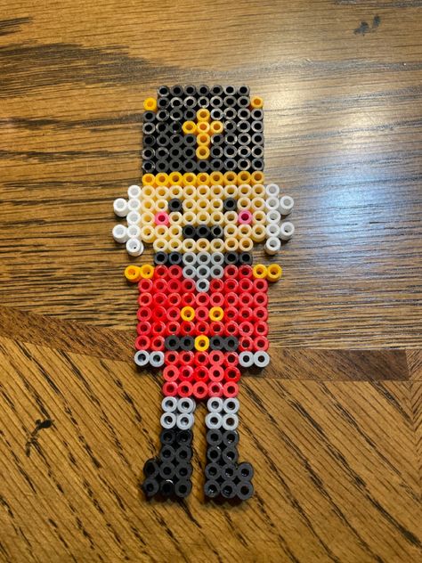 Nutcracker Perler Beads, Nutcracker Perler Bead Patterns, Candy Cane Perler Bead Patterns, Perler Beads Christmas Patterns, Perel Beads Ideas, Perler Bead Christmas Patterns, Christmas Beads Ideas, Perler Bead Christmas Ornaments, Hamahelmi Ideas