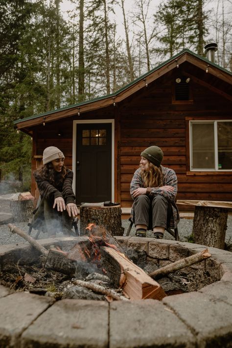 Girls enjoying the fire outside Hayes Hideout Cozy Cabin Getaway, Munduk Cabin, Cabin Lifestyle Photography, Cabin In Washington State, Getaway Cabin Couple, Romantic Cabin Getaway Couple, Comfortable Beds, Secluded Cabin, Beautiful Cabins