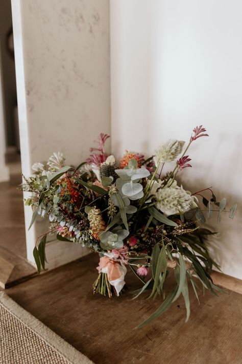 Australian native wildflowers are dainty, soft and feminine. Monique's bouquet was a tribute to the wildflower garden she created with her Auntie Francie.  Photography @makeoneswayweddings @floraadorastudio @craigioscott   wedding flower ideas, wedding flower inspiration, wedding flower arrangements, wedding flowers, fairytale wedding, wedding dinner table setting, bridal bouquets, bridesmaid bouquet, wedding bouquets Australian Backyard Wedding, Native Flower Wedding, Australian Native Wedding Bouquet, Native Wedding Bouquet, Native Wedding Flowers, Australian Bouquet, Australian Native Wedding, Wedding Dinner Table Setting, Rustic Forest Wedding