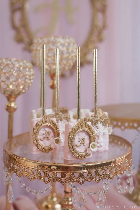 Arianas Royal Baptism | CatchMyParty.com Princess Theme Rice Crispy Treats, Princess Party Cake Pops, Rose Gold Treats Ideas, Quinceanera Treats Ideas, Princess Party Dessert Table, Rose Gold Candy Table Ideas, Princess Theme Dessert Table, Cookies Decoration Ideas, Royal Food