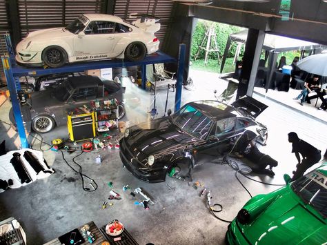 RWB Porsches in the making Tuner Garage, Porsche Garage, Car Mechanics Garage, Mechanics Aesthetic, Garage Design Interior, Mechanical Workshop, Mechanic Shop, Auto Shop, Car Workshop