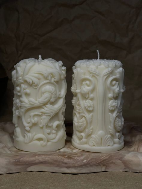 The surface of the candle is decorated with complex patterns inspired by Gothic architecture: curved arches, stone chisels, filigree carvings and geometric patterns. The ornament on the candle creates a play of light and shadow, giving it a special charm and elegance. When the candle is lit, the patterns cast shadows, creating interesting patterns on the walls and ceiling, reminiscent of Gothic windows and cathedral arches. This candle becomes not only a source of light, but also an expressive e Classy Home Aesthetic, Long Candles Decoration, Baroque House Decor, Baroque Wedding Decor, Victorian Gothic Wedding Decorations, Candleabras Wedding Centerpiece, Cute Things To Buy For Your Room, Gothic Ceramics, Light Gothic Decor