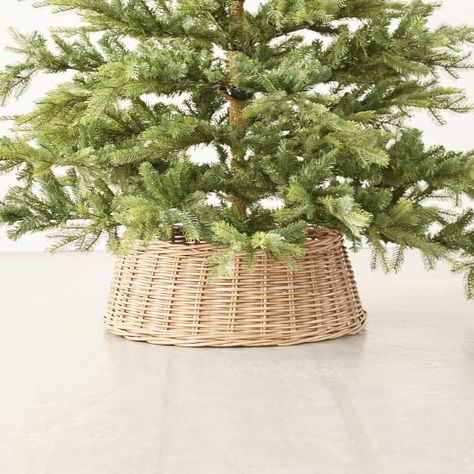 The Christmas Tree Hack You Never Knew You Needed Basket Tree Skirt, Grey Wicker Baskets, Basket Tree, French Christmas Decor, Natal Natural, Christmas Tree In Basket, Wicker Tree Skirt, Best Artificial Christmas Trees, Fake Christmas Trees