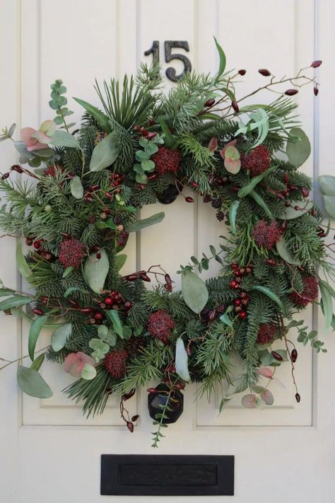 Explore the magic of the festive season with our selection of 17 Christmas wreaths, each a unique blend of traditional charm and contemporary elegance. Click to discover the perfect wreath to adorn your home, and follow us for more inspired Christmas decor ideas. Everlasting Wreaths, Fresh Wreaths, Winter Flower Arrangements, Faux Wreath, Fresh Christmas Wreath, Winter Floral Arrangements, Fresh Wreath, Christmas Decs, Christmas Flower Arrangements