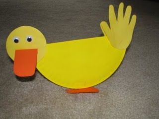 duck craft - we're going to do something like this only probably not use a hand for a tail. Paper Plate Duck, Duck Craft, Craft Kindergarten, Make Way For Ducklings, Duck Crafts, Sheep Head, Storytime Crafts, Farm Unit, Farm Preschool