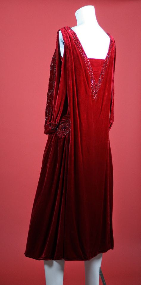 Vintage 1920s Beaded Red Silk Velvet Party Dress. Truly one of a kind! Rare beaded red silk velvet flapper dress. Lined with fabric that feels like silk. Sophisticated draped front, shoulder criss cross bands, medallion style beading at the hips. (hva) Style Année 20, Roaring 1920s, Flapper Style Dresses, 1920s Party, 1920s Outfits, 1920 Fashion, Vintage Party Dresses, Elsa Schiaparelli, 20th Century Fashion