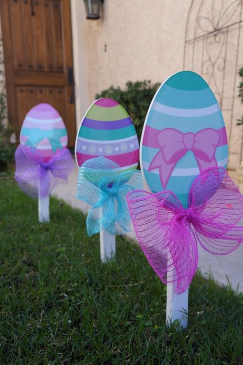 Celebrate Easter with these cute Easter Egg Lollipops!! Great for yards, patios and indoor planters too. Fun to line your driveway and walkways. They come in a set of 3 eggs. Each Lollipop has a mesh ribbon and stands 22 inched tall. Graphics by Pixel Paper Prints. Easter sneaks up on us! Order Mickey Easter Eggs, Easter Yard Art, Easter Yard Decorations, Diy Osterschmuck, Easter Outdoor, Easter Wood Crafts, Yard Decorations, Easter Projects, Easter Decorations Outdoor