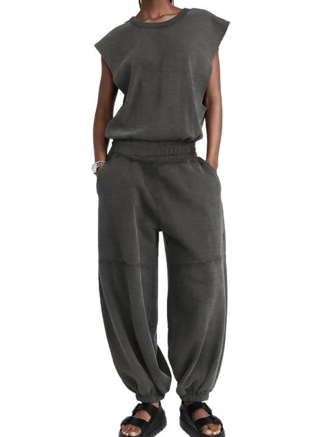 PRICES MAY VARY. ▪️Material：The sleeveless onesie is made of light and soft fabric that is soft,elastic and breathable;Comfortable and skin-friendly;You can wear it alone in summer;Spring,Fall and winter can be matched with coats, jackets and down jackets,etc. ▪️Features：Crew neck oneise jumpsuit,open back one piece sets,jogger jumpsuit for women,sleeveless jumpsuits for women,cap sleeve jumpsuits for women,loose wide leg pants design, fashion casual cool style with sexy elements.You need this c Pants Design Fashion, Travel Outfit Long Flights, Open Back Sweatshirt, Jogger Jumpsuit, Pant Romper, Romper Long Pants, Sporty Fashion, Jumpsuit With Pockets, Romper Jumpsuit