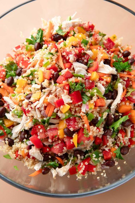 This flavorful and colorful Chicken Quinoa Salad is meal prep friendly loaded with veggie goodness! Shredded rotisserie chicken is paired with a medley of tomatoes, carrots, peppers, onion, black beans and kale and tossed with fluffy quinoa and the most flavorful dijon dressing. Chicken Peas Recipe, Beans And Kale, Fluffy Quinoa, Shredded Rotisserie Chicken, Chicken Quinoa Salad, Dijon Dressing, Apple Salad Recipes, Cooked Quinoa, Chicken Quinoa