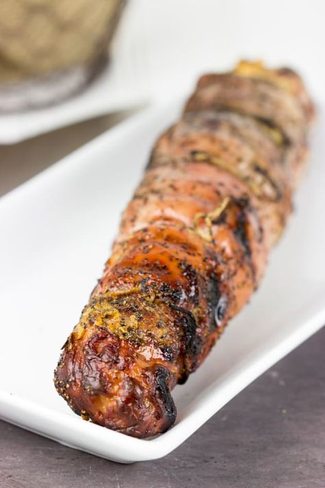 Bacon Wrapped Stuffed Pork Tenderloin has a jalapeno cream cheese filling. And all topped with fabulous bacon. Grilled Pork Tenderloins, Stuffed Pork Loin, Pork Tenderloins, Stuffed Pork, Grilled Pork Tenderloin, Stuffed Jalapenos With Bacon, Pork Dinner, Tenderloin Recipes, Pork Tenderloin Recipes