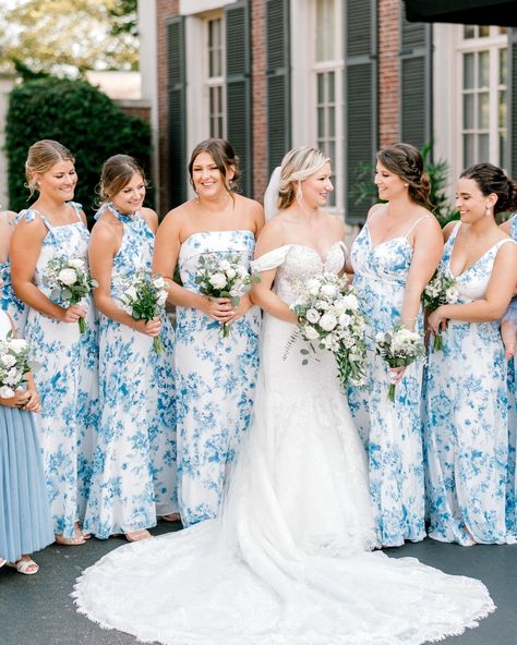 Summer wedding inspiration. Blue floral bridesmaid dresses with white rose bouquets. Floral Bridesmaid Dresses Blue, Blue Floral Bridal Party, Blue Floral Dress Bridesmaid, Blue Floral Bridesmaid Dress, Floral Bridesmaids Dresses Mismatched, Floral Blue Bridesmaid Dresses, White Floral Bridesmaid Dresses, Blue And White Bridesmaid Dresses, Floral Bridesmaid Dresses Long