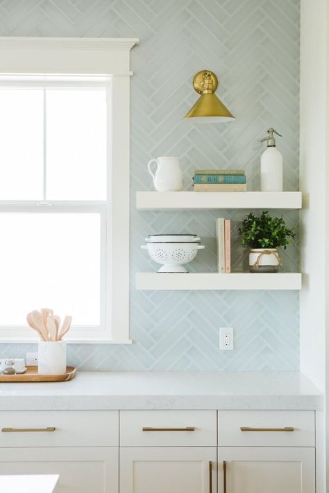 light blue glass tile with white open shelves in a kitchen Beach Kitchen Backsplash Ideas, Light Blue Backsplash, Blue Backsplash Kitchen, Modern Coastal Kitchen, Mantel Styling, Light Blue Kitchens, Coastal Kitchen Decor, Blue Backsplash, Beach House Kitchens