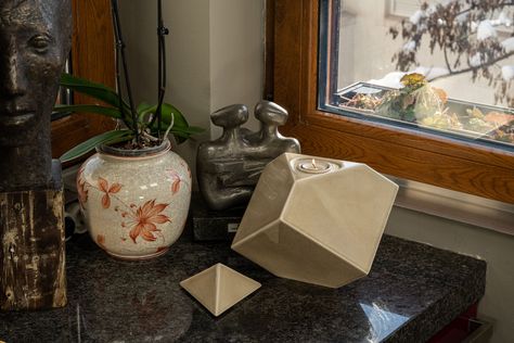 Looking for inspiration on where to place your urn? Our list of 10 creative locations will bring beauty to your décor. Read our blog below: https://www.urnsforangels.com/blogs/inspiration/10-creative-places-to-put-your-urn-in-the-home #urns #urn #urnsforashes #explore #cremation #cremationurns Urns For Ashes, Ceramic Urn, Modern Heart, Urn For Ashes, Raku Ceramics, Memorial Candle, Raku Pottery, Cremation Ashes, Grey Ceramics