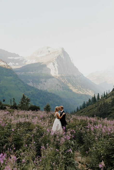 Megan and Gunnar shared their private vows to each other outside Glacier National park before celebrating with friends and family at Under Canvas. Wedding In The Mountains Colorado, Wedding Mountain Theme, Small Mountain Wedding, Mountain Wedding Colors, Park Ceremony, Wilderness Wedding, Glacier Wedding, Glacier Elopement, Montana Bride