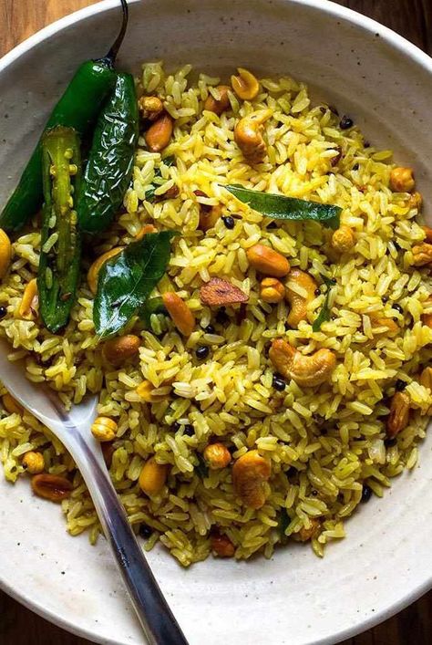 Use up leftover rice and make it into something delicious with this healthy Indian recipe. Because cooked rice refrigerated overnight dries out a little, it's better suited to absorb all the flavors in this dish without getting sticky or mushy. In a pinch, use frozen or shelf-stable precooked basmati rice, available in many stores. Urad dal and roasted chana dal add texture and authenticity to the rice--look for both types of dal in Indian markets or online. Healthy Indian Recipes, Quick Side Dishes, Lemon Rice, Dairy Free Eggs, Basmati Rice, Vegetable Sides, Healthy Side Dishes, Soy Free, Side Recipes