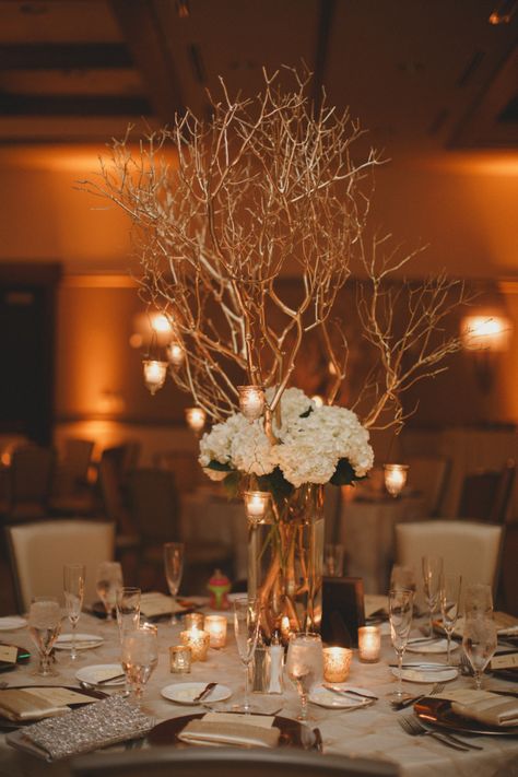 Gold Branches Centerpiece, Gold Branch Centerpiece, Tree Centrepiece Wedding Fairy Lights, Gold Manzanita Tree Centerpieces, 50th Anniversary Table Decorations, Winter Wonderland Centerpieces With Branch Tree, Tree Branch Centerpieces Gold, Dusty Rose Wedding Colors, Branch Centerpieces Wedding