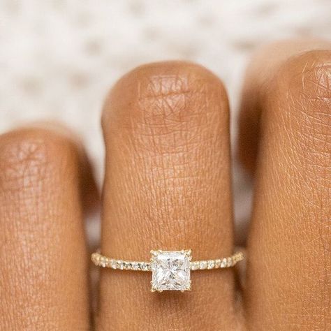 Melanie Casey Fine Jewelry on Instagram: "A dainty diamond band and a triple prong setting dress up this princess cut diamond, for an elegant engagement ring in 14k gold. What band would you pair with the Unveiled Ring with Pave Band, 0.7ct. Princess Cut Diamond? For more information on this piece, visit melaniecasey.com! 💫" Princess Cut Gold Engagement Rings, Princess Pave Engagement Ring, Dainty Engagement Ring Princess Cut, Pave Engagement Ring Gold, Square Diamond Ring Gold, Wedding Ring Princess, Dainty Square Engagement Ring, Classy Engagement Ring Princess Cut, Small Square Rings Engagement