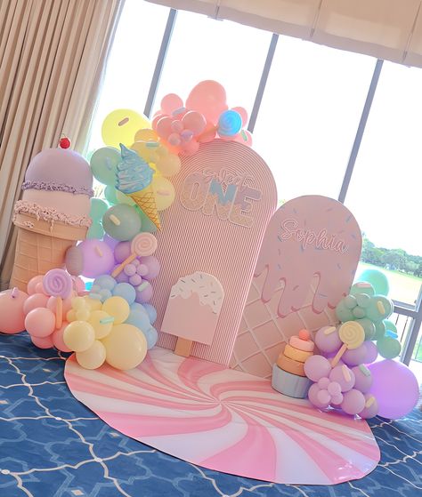 Sophia’s Sweet One 🍦🍬🍭 Backdrop + Balloons + decor @janettloveshop Bounce House + Ball Pit @bouncebrightparty #sweetone #sweetonetheme #sweetonebirthday #sweetonebackdrop #sweetoneballoons #sweetoneballoongarland #icecream #icecreamthemedparty #candyland #candylandtheme #candylandparty #firstbirthday #firstbirrhdayideas Candy Shop Theme Party, Candy Birthday Backdrop, Sweet One Diy Decorations, Candy Land First Birthday Party, Pastel Candy Birthday Party, Candyland First Birthday Party Girl, Sweet One Balloon Arch, Sweet 1 Birthday Party Girl, Candyland Baby Shower Theme