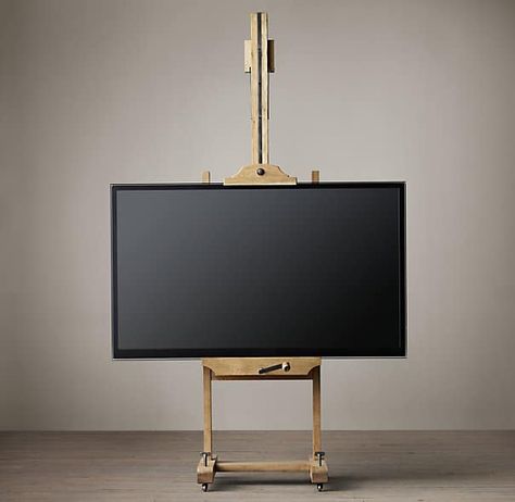 8 great ways to incorporate a flat screen television into a room. - The Art of Doing Stuff Easel Tv Stand, Outdoor Tv Cabinet, Tv Floor Stand, Ac Cover, Rh Rugs, Artist Easel, Art Easel, Outdoor Tv, Tv Decor