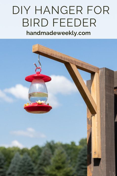 How to make a simple wood bird feeder hanger to attach to a post. This is great for bird feeders or hanging baskets. Ways To Hang Bird Feeders, Bird Feeder Hangers Diy, Bird Platform Feeder Diy, Bird Feeder Hangers Outdoor, Hanging Bird Feeders Diy Wooden, Diy Platform Bird Feeder With Roof, Bird Feeder Hangers, Easy Small Wood Projects, Wood Bird Feeder