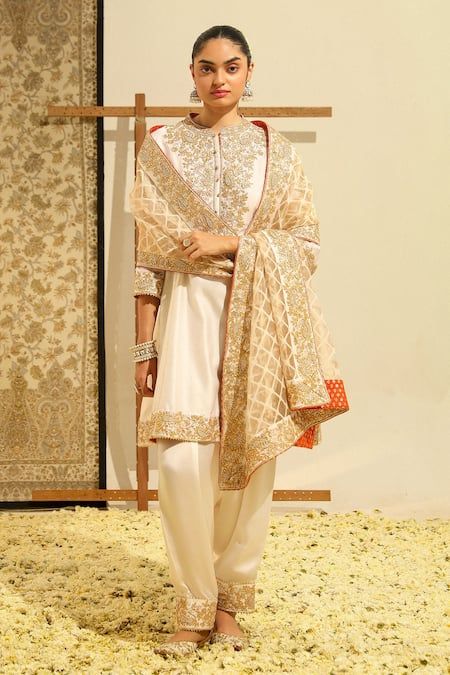 Buy Ivory Kurta Silk Chanderi Embroidery Dabka Round Rajak Placket Salwar Set For Women by Sheetal Batra Online at Aza Fashions. Haldi Dress, Salwar Pattern, Zardozi Embroidery, Embroidered Hem, Suits Design, Embroidered Border, Embroidery Suits Design, Satin Color, Embroidery Suits