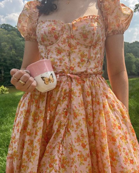 let august be august 🩰🧺 @houseofcb #cottagecore #cottagestyle #shabbychic #fairyaesthetic #slowliving #bridgertonstyle Orange Cottage Core Dress, Orange Cottagecore Outfit, Let August Be August, Coquette Orange Dress, Yellow Fitted Cottagecore Dress, Orange Coquette, Spring Princesscore Dresses With Floral Print, Bright Outfit, Coquette Outfit