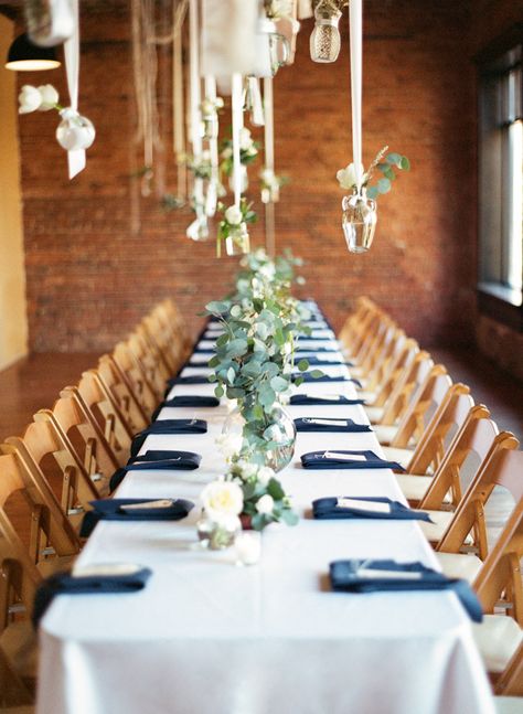 Navy Blue Long Table Wedding, Two Long Tables Wedding, Navy And White Table Setting, Leafy Centerpieces, Navy Tablescape, Navy Napkins, Wedding Warehouse, Candles Hanging, Hanging Bottles