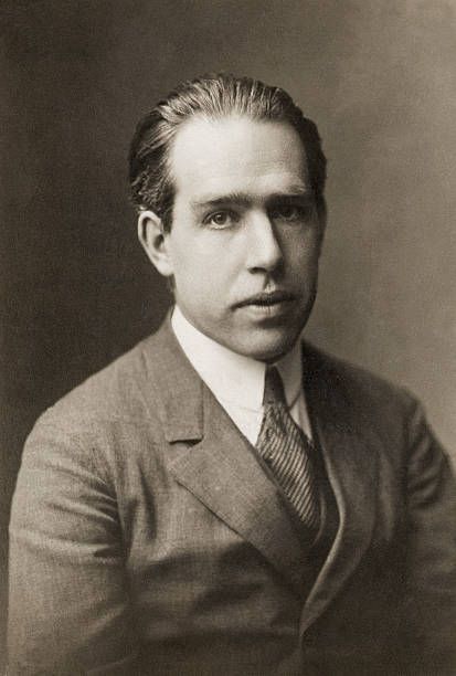 Portrait of Niels Bohr Danish physicist Proposed a theory of atomic structure based on Planck's quantum theory and was awarded the 1922 Nobel Prize... Great Scientists, Colorized Historical Photos, Atomic Theory, Quantum Theory, Nobel Prize In Physics, Niels Bohr, Kingdom Of Denmark, Famous Scientist, 7 October