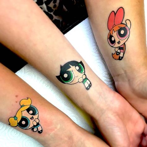 79 Sibling Tattoos To Get With Brothers And Sisters Cousins Tattoos Matching, Powerpuff Girls Tattoo Siblings, Matching Tattoos For Big Friend Groups, Powder Puff Girls Tattoo, Powderpuff Girls Tattoo Ideas, Mean Girls Tattoo, Matching Tattoos For 3 Sisters, Sister Tattoo For 3, Sibling Tattoos For 3 Meaningful