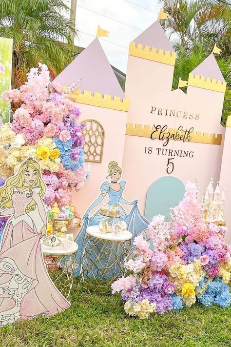 Feast your eyes on this magical princess-themed birthday party! The dessert table is so impressive! See more party ideas and share yours at CatchMyParty.com Disney Princess Birthday Party Centerpieces Table Decorations, Princess Theme Dessert Table, Princess Theme Birthday Party Decoration, Princess Party Ideas Decorations, Disney Princess Backdrop, Birthday Princess Theme, Disney Princess Theme Birthday Party, Disney Princess Theme Party, Princess Themed Birthday Party