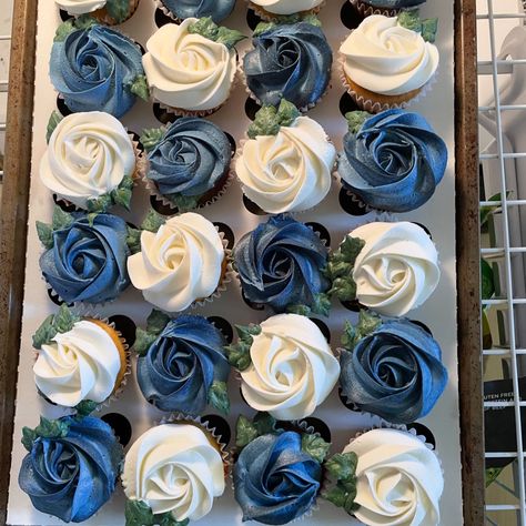 Blue and white rosettes Navy And Dusty Blue Cupcakes, Blue And Green Wedding Cupcakes, Something Blue Bridal Shower Cupcakes, Dusty Blue Wedding Cupcakes, Blue And White Cupcakes, Blue Wedding Cupcakes, Navy Cupcakes, White Wedding Cupcakes, Rosette Cupcakes