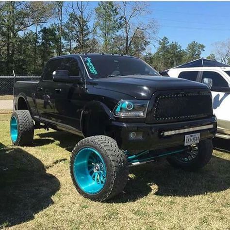 4th gen Ram lifted - black and turquoise Ram Dually Lifted, Black Truck With Blue Accents, Ram 2500 Mega Cab Lifted, Ram 3500 Mega Cab Dually, Jacked Up Chevy, Ram 2500 Flatbed, American Force Wheels, Custom Lifted Trucks, Chevy Diesel Trucks