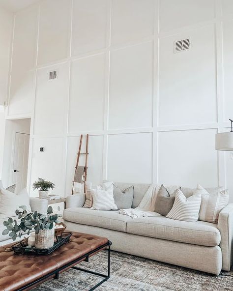 Linsey | Home Decor on Instagram: "Want to recreate this wall? Save this post for future reference! Here’s the measurement + paint details 👇🏼 Existing wall size: 18’ tall x 22.5’ wide Boards: 1” x 3.5” Rectangle sizes: 41” wide x 67” tall Hardboard Panels (For a smooth wall texture): 1/8” thickness Paint: Polar Bear by Behr You’ll of course want to scale to fit your own wall size, but hoping this comes in handy for reference! Interested in shopping this space? Visit the link in my bio Smooth Wall Texture, Tall Ceiling Living Room, Wall Behind Sofa, Cozy Neutral Living Room, Room Accent Wall, Sofa Wall, Accent Walls In Living Room, Accent Wall Bedroom, Corner House