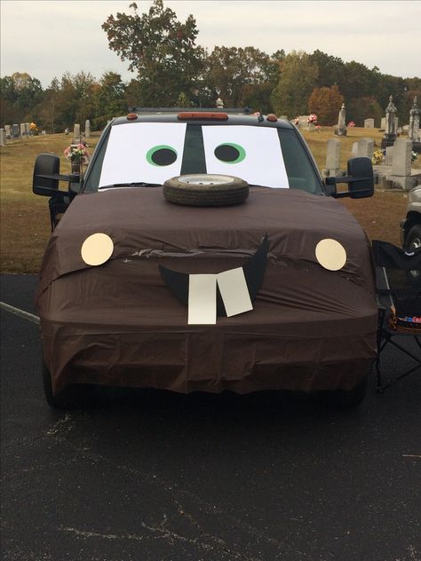 Tow Mater Trunk or Treat Tow Mater Trunk Or Treat, Mater Trunk Or Treat, Pick Up Truck Trunk Or Treat Ideas, Trunk Or Treat Truck Bed, Paw Patrol Trunk Or Treat, Trunk Or Treat Ideas For Trucks, Trunk Or Treat Truck, Trunk Or Treat Halloween, Halloween Car Decorations