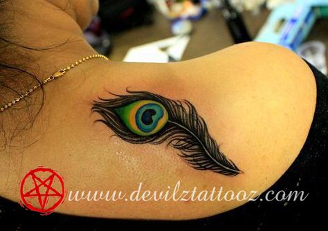 Peacock Feather Tattoo Art Peacock Feather Tattoo Design For Women, Feather Tattoo Art, Feather Tattoo Black, Peacock Centerpieces, Wrist Tattoo Cover Up, Krishna Tattoo, Tattoo Design For Hand, Letter Tattoo, Peacock Feather Tattoo