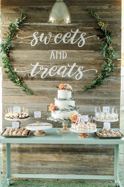 Wedding reception cake table sweets and treats wood backdrop His And Her Dessert Table, Desert Table Ideas Simple, Backdrop Behind Cake Table, Sweet Treats Wedding Table, Sweet Table Wedding Rustic, Wedding Reception Treats, Wedding Table Dessert, Outdoor Wedding Dessert Table, Cake Table Display Ideas