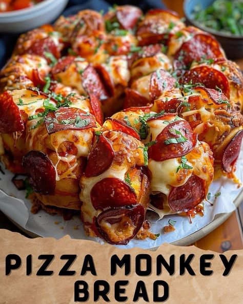 Pizza monkey bread Ingredients:  32 ounces refrigerated canned biscuits, cut into quarters 6 ounces pepperoni, sliced 2 cups mozzarella cheese, shredded ½ cup parmesan cheese, grated ⅓ cup butter, melted 1 tablespoon Italian seasoning ½ teaspoon garlic powder ¼ teaspoon garlic salt Red pepper flakes, optional Fresh parsley, for garnish Marinara sauce, for dipping  Directions:  Preheat oven: Preheat your oven to 350 degrees Fahrenheit (175 degrees Celsius). Grease a bundt pan with nonstick cooking spray and set it aside.  Prepare ingredients: Cut the refrigerated canned biscuits into quarters and slice the pepperoni pieces in half.  Mix ingredients: In a large mixing bowl, combine the biscuit pieces, sliced pepperoni, mozzarella cheese, parmesan cheese, melted butter, Italian seasoning, gar Pizza Monkey Bread Recipe, Food Recipes For Breakfast, Savory Rolls, Pizza Monkey Bread, Monkey Bread Recipe, Pizza Homemade, Yeast Recipes, Canned Biscuits, Appetizers Easy Finger Food