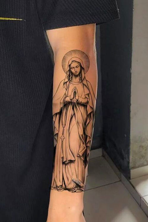 Tattoo Of Praying Hands With The Virgin Mary
#DeadVirgin #DeadMartTattoos #Marytattoo #tattooIdeas #TattooStyle #ChristianTattoo #TraditionalTattoo #ReligiousTattoo #Tattoo Virgin Mary Calf Tattoo, Saint Maria Tattoo, Blessed Mary Tattoo, Blessed Mother Tattoos Virgin Mary, Virgin Fatima Tattoo, Saint Tattoo Design, Saint Cecilia Tattoo, Catholic Sleeve Tattoo Men, Virgin Mary Arm Tattoo