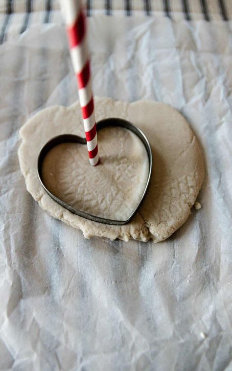 Get crafty with this easy DIY salt dough heart garland! Perfect for adding a touch of love to your home decor. Follow the simple steps and ingredients to create your own unique garland. #DIY #SaltDough #HeartGarland #HomeDecor Diy Salt Dough, Salt Dough Crafts, Salt Dough Ornaments, Dough Ornaments, Garland Diy, Paper Doilies, Heart Garland, Valentine's Day Decor, Heart Cookies