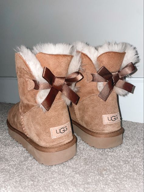 Vegan Uggs, Pink Uggs With Bows, Bow Uggs, Pearl Boots, Cute Uggs, Uggs With Bows, Tall Uggs, Chestnut Uggs, Pretty Shoes Sneakers