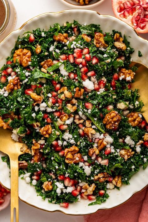 This kale pomegranate salad (aka Christmas Salad) is super easy to whip up and makes for a festive and healthy option for the holidays. Fig Pomegranate Salad, Winter Salad Pomegranate Goat Cheese, Healthy Salad Recipes For Christmas, Spinach Salad Christmas, Winter Salad Vegetarian, Holiday Kale Salad, Christmas Italian Salad, Cooked Vegetable Salad, Pomegranate Food Ideas