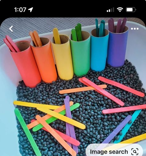 Colours Sensory Bin, Pop It Sensory Bin, Rainbow Theme Sensory Bin, Simple Sensory Bin Ideas, Non Toxic Sensory Bin, Rainbow Preschool Sensory Bin, March Sensory Bins For Preschool, Color Matching Popsicle Sticks, Cute Sensory Bin Ideas