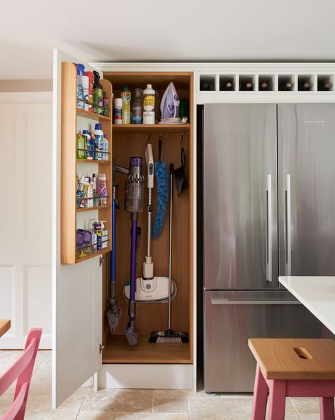 Kitchen cupboards are for more than just food storage. This clever design holds hoovers, brooms, mops, irons and an arrany of cleaning products Tall Cupboard, Cleaning Cupboard, Utility Cupboard, Storage Cupboard, Breakfast Bar Kitchen, Utility Storage, Wardrobe Furniture, Laundry Appliances, Painted Kitchen