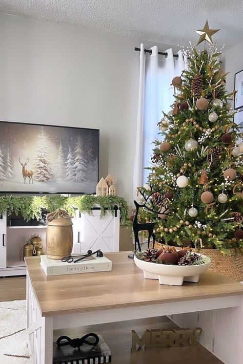 28 Neutral Christmas Tree Ideas For Cozy Holiday Decor - The Chic Quota Neutral Cozy Christmas Decor, Neutral Christmas Coffee Table Decor, Neutral Christmas Tree Decor Ideas, Clean Christmas Tree, Woodland Theme Christmas Tree, Neutral Christmas Tree Ideas, Modern Organic Christmas, Neutral Christmas Tree Decor, Farmhouse Christmas Tree Ideas